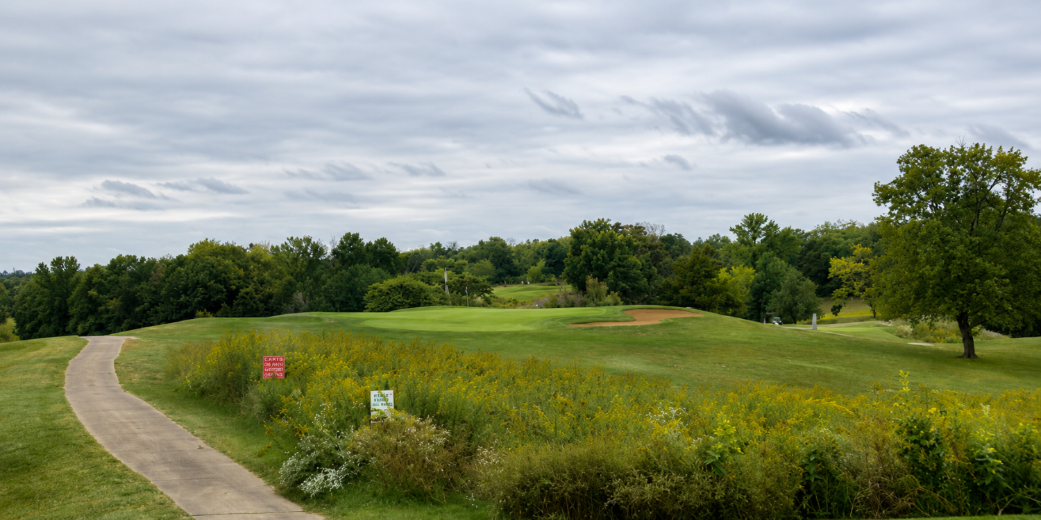 Some hallmarks of the Gustin Golf Course are visible from the par-3 2nd Hole’s tee: a table-top green and a pollinator patch.